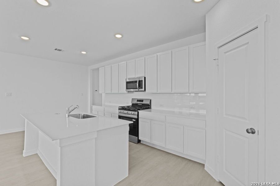 Furnished interior view inside a new home in Brookmill, San Antonio (Image 6).