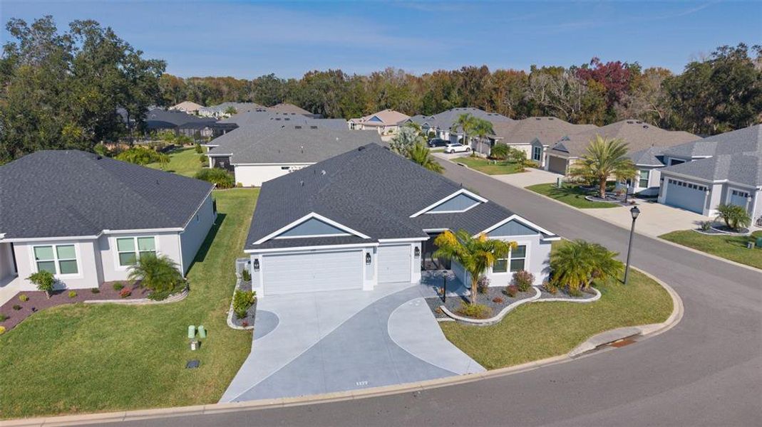 Front exterior of a new home in , The Villages, FL, highlighting curb appeal (Image 2). Front exterior of a new home in , The Villages, FL, highlighting curb appeal (Image 2).