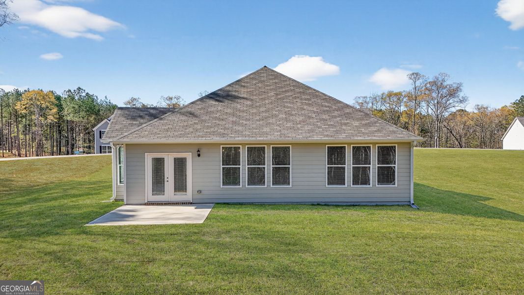 Exterior details and patio area of a home in Stone Brooke, Gray (Image 13).