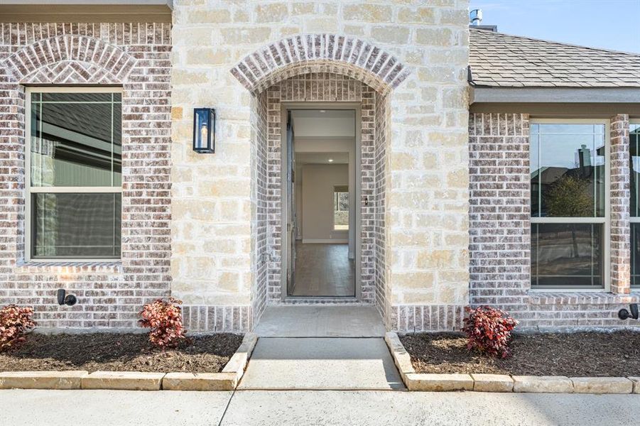Exterior details and patio area of a home in Abe's Landing, Granbury (Image 25).