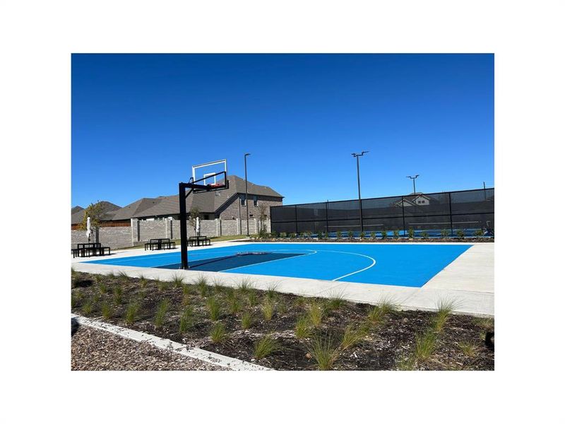 View of basketball court and tennis court