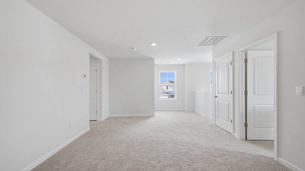 Representative unfurnished interior of a home built from the Belfort by D.R. Horton in Hamptons at Riverwood North, Dallas (Image 25).