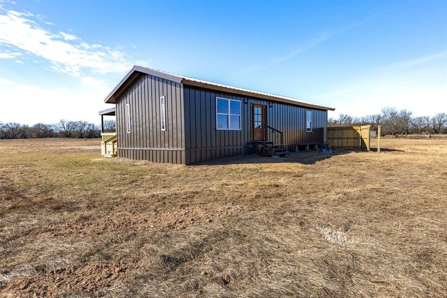 Exterior details and patio area of a home in , Point (Image 16).