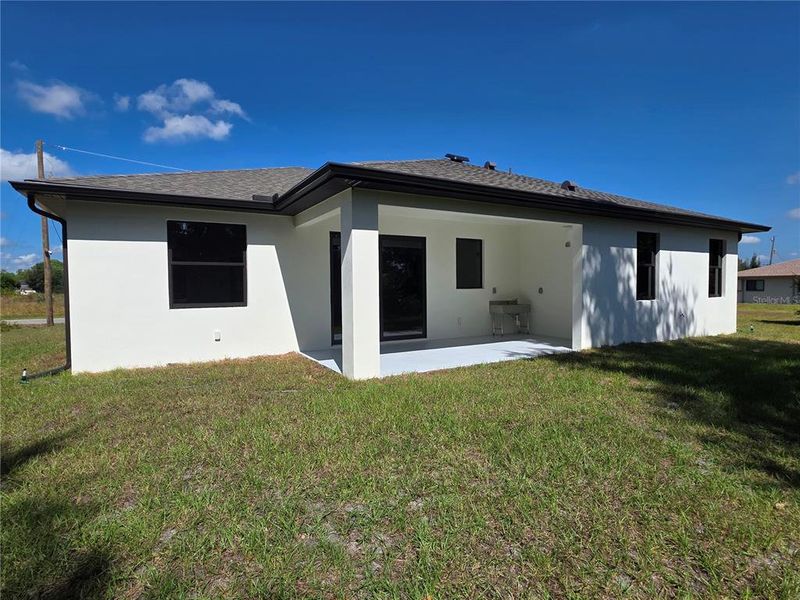 Exterior details and patio area of a home in , North Port (Image 35).