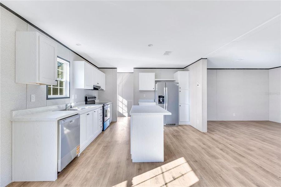Furnished interior view inside a new home in , St. Cloud (Image 3).