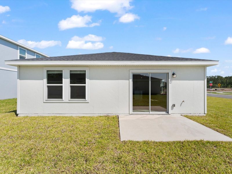 Exterior details and patio area of a home in Flagler Village - Classic Series, Palm Coast (Image 3). Exterior details and patio area of a home in Flagler Village - Classic Series, Palm Coast (Image 3).