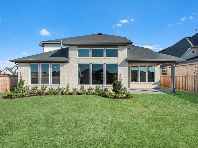 Exterior details and patio area of a home in Dunham Pointe 60′, Cypress (Image 4).