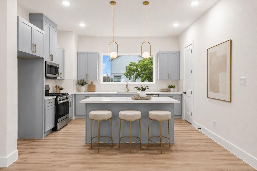 Island kitchen. Photo has been virtually staged.