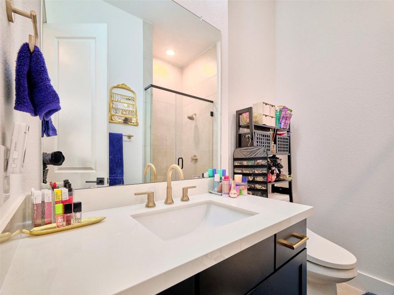 Guest quarters include custom walk in closets and shower bath.