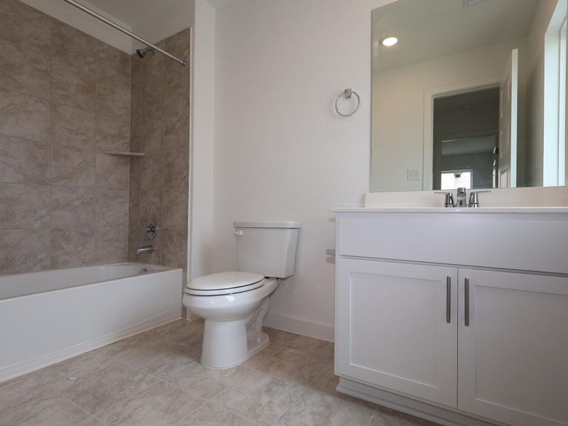 Furnished interior view inside a new home in Heritage, Dripping Springs (Image 5).