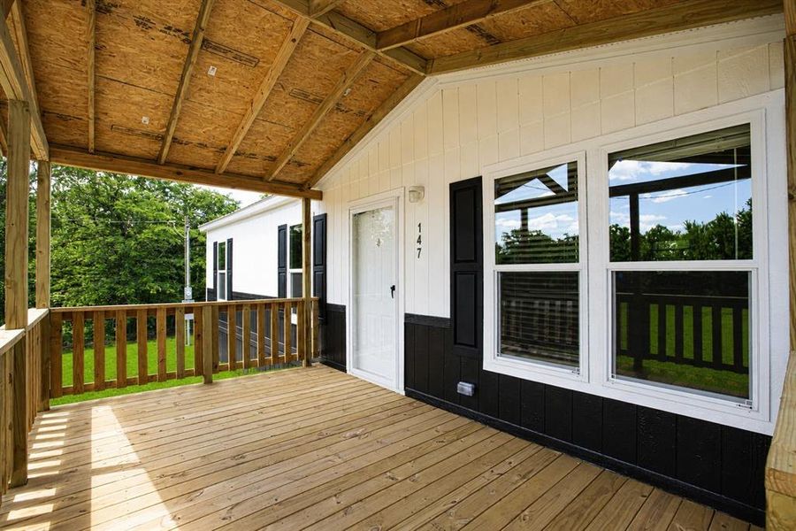 Exterior details and patio area of a home in , Runaway Bay (Image 20).