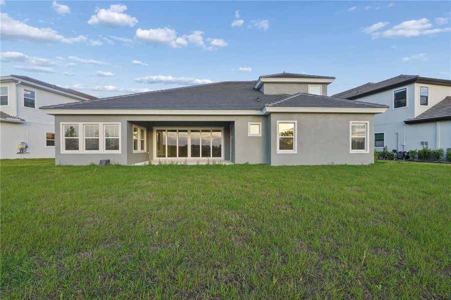 Exterior details and patio area of a home in , Zephyrhills (Image 32).