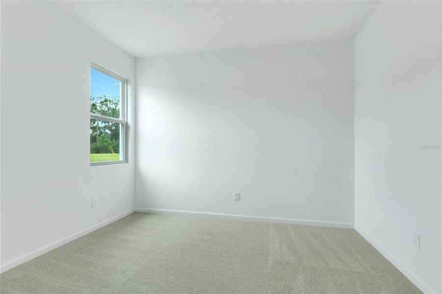 Spacious, unfurnished interior of a new home in Seasons at Grandview Gardens, Deland (Image 13).