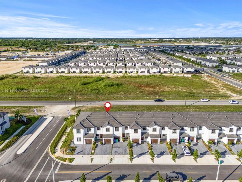 Front exterior of a new home in , Homestead, FL, highlighting curb appeal (Image 23). Front exterior of a new home in , Homestead, FL, highlighting curb appeal (Image 23).