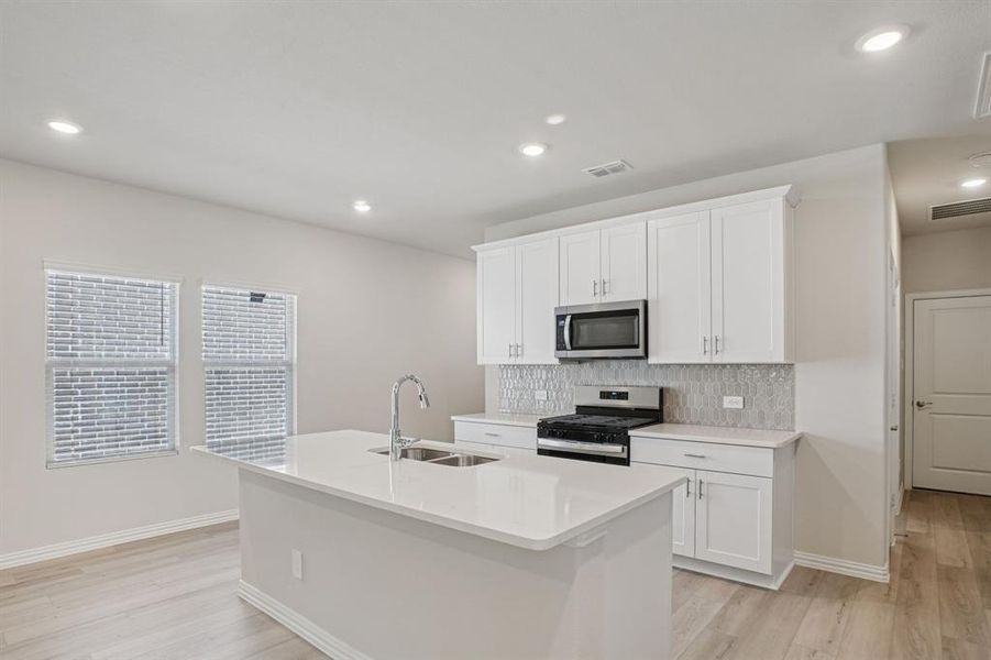 Photo is not of the actual home, but is an inspirational photo of builder’s model home and may depict options, furnishings, and/or decorator features that are not included.