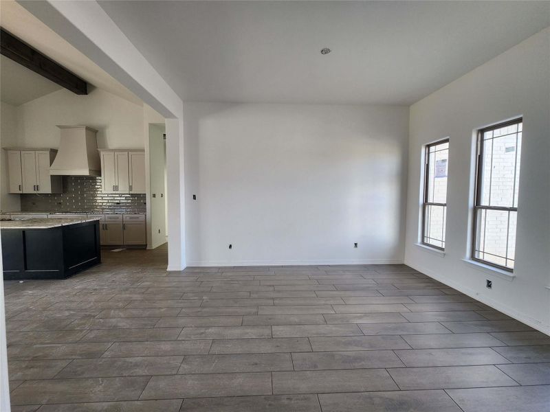 Wood-finish plank flooring extending through the main living area