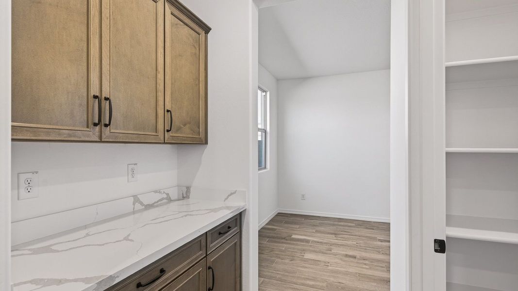 Furnished interior view inside a new home in The Grove at El Cidro, Goodyear (Image 6).