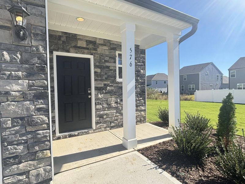 Exterior details and patio area of a home in Daniel Farms, Benson (Image 3).