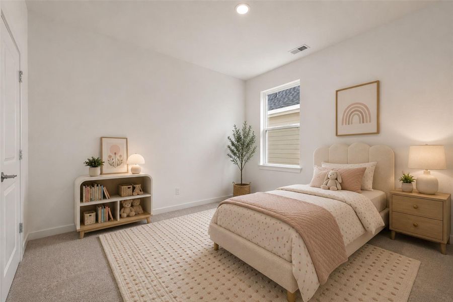 Downstairs secondary bedroom featuring a spacious layout, carpeted flooring, and convenient first-floor access. Flexible space suitable for a variety of living needs. Virtually staged to help illustrate furnishing possibilities and room functionality.