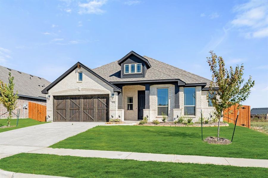 Front exterior of a new home in The Retreat at North Grove 60, Waxahachie, TX, highlighting curb appeal (Image 16). Front exterior of a new home in The Retreat at North Grove 60, Waxahachie, TX, highlighting curb appeal (Image 16).