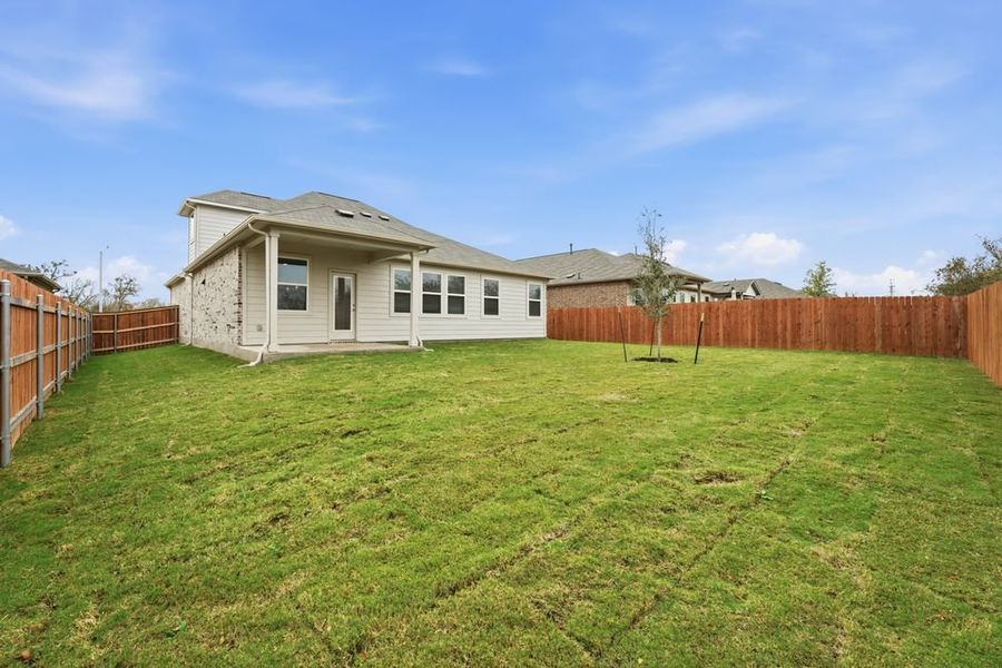 Exterior details and patio area of a home in Lisso 60s, Pflugerville (Image 14).