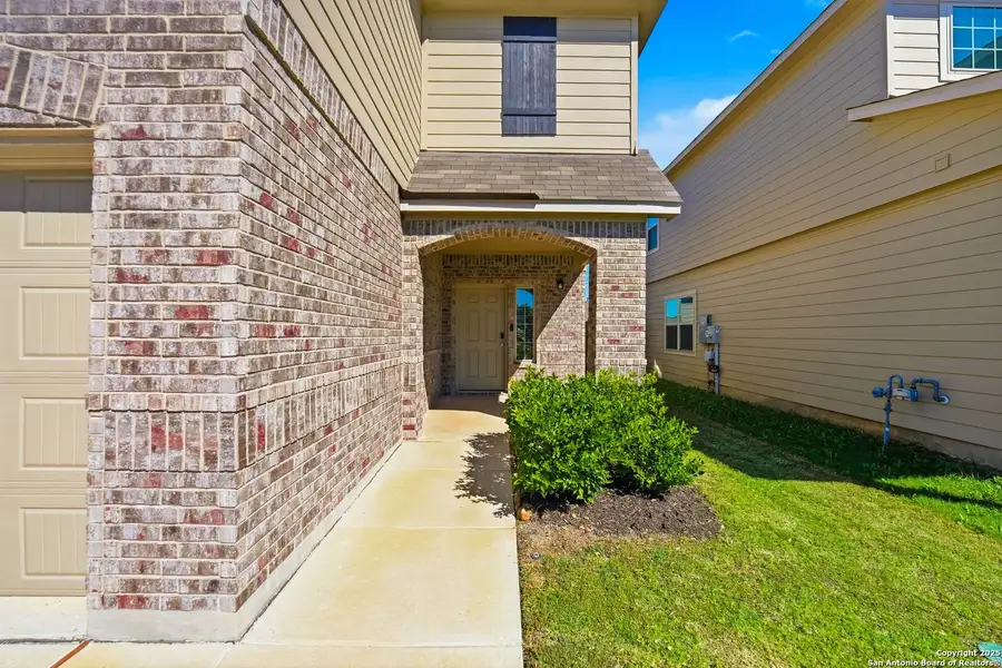 Exterior details and patio area of a home in Abbott Place, St. Hedwig (Image 3).