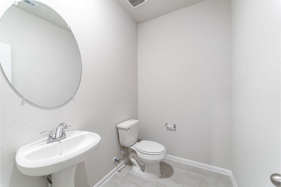 Furnished interior view inside a new home in Canterra Creek, Iowa Colony (Image 15).