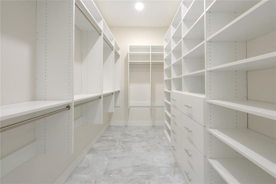 Huge walk-in him and her closets!