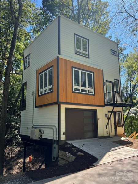 Front + Side View (Driveway Complete) Front + Side View (Driveway Complete)