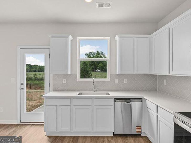 Furnished interior view inside a new home in Remington Chase, Perry (Image 7).