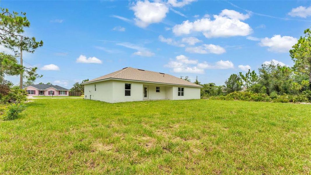Front exterior of a new home in , Sebring, FL, highlighting curb appeal (Image 26).