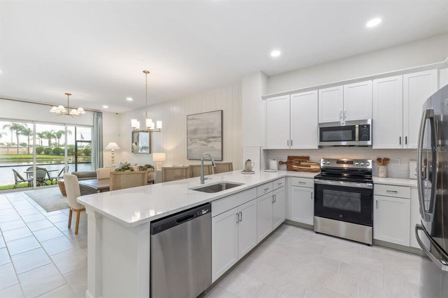 Furnished interior view inside a new home in Kings Gate, Port Charlotte (Image 8).