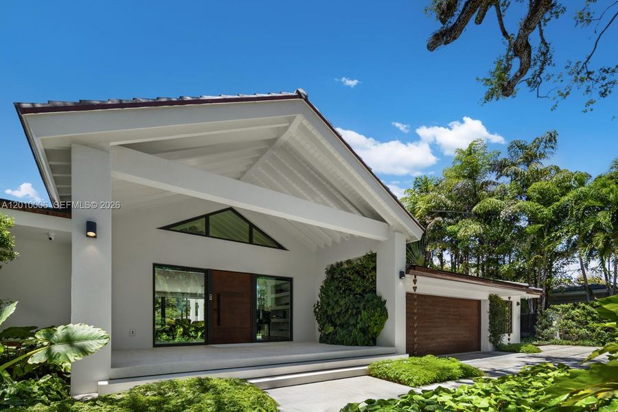 Exterior details and patio area of a home in , Coral Gables (Image 24).