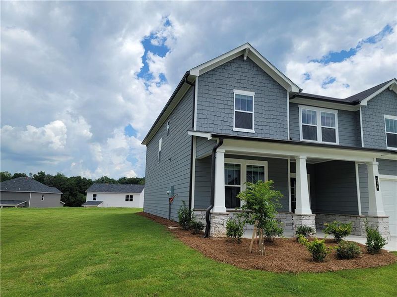 Front exterior of a new home in Reserve at Gum Springs, Jefferson, GA, highlighting curb appeal (Image 2). Front exterior of a new home in Reserve at Gum Springs, Jefferson, GA, highlighting curb appeal (Image 2).