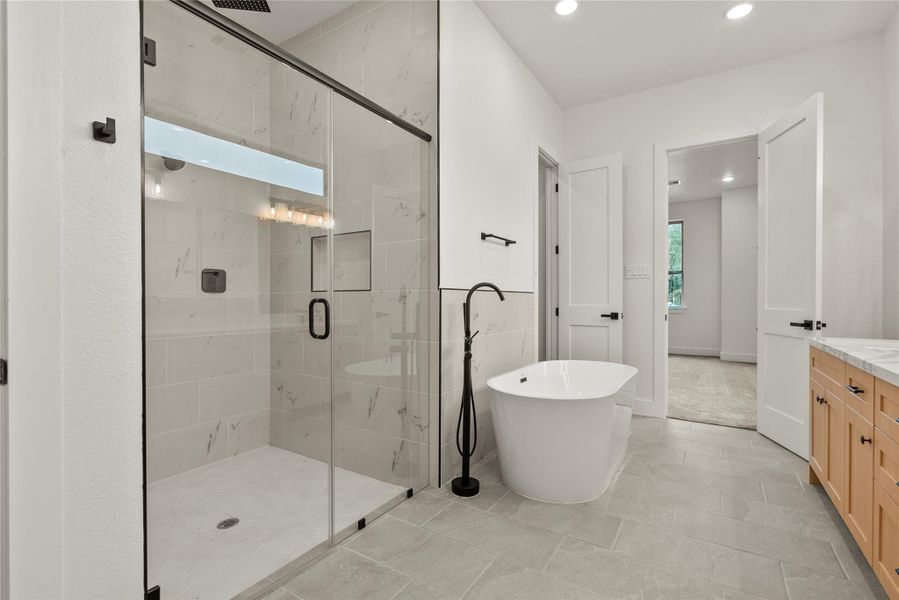 The standing shower comes equipped with waterfall shower head The standing shower comes equipped with waterfall shower head