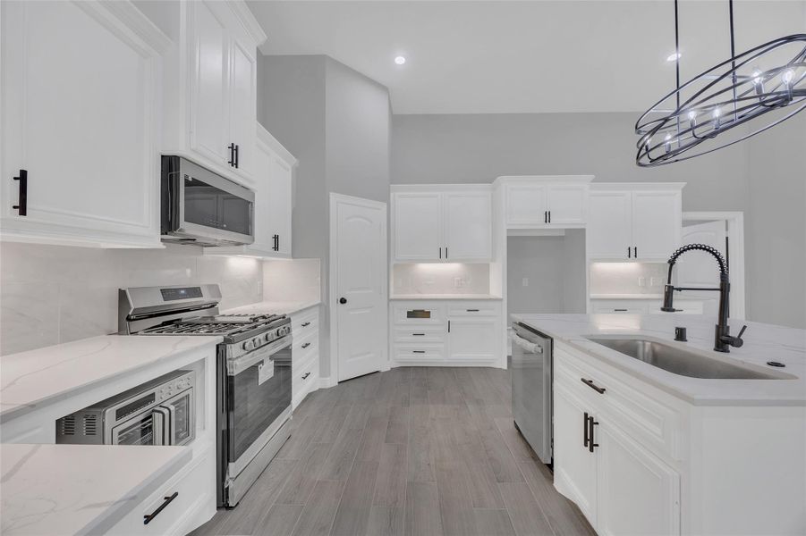 Furnished interior view inside a new home in , New Waverly (Image 4). Furnished interior view inside a new home in , New Waverly (Image 4).