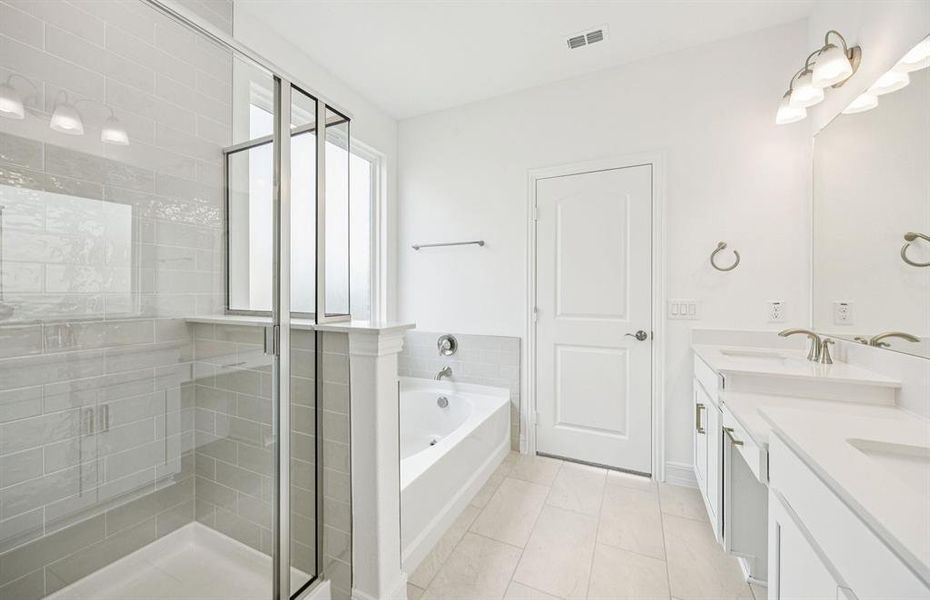 Deep walk-in shower designed for relaxation in the owner's bath *Real home pictured Deep walk-in shower designed for relaxation in the owner's bath *Real home pictured