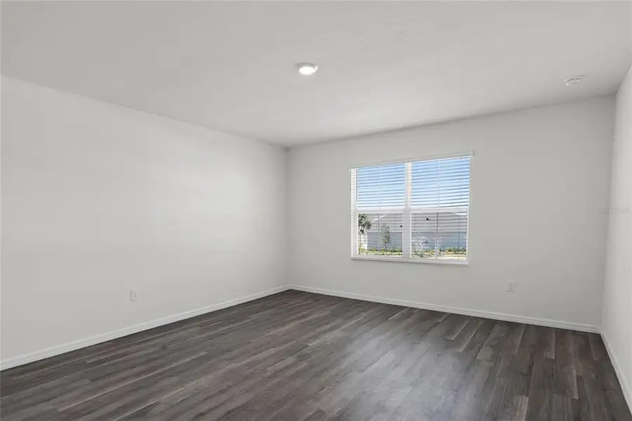 Spacious, unfurnished interior of a new home in Harmony at Lake Eloise, Winter Haven (Image 17). Spacious, unfurnished interior of a new home in Harmony at Lake Eloise, Winter Haven (Image 17).