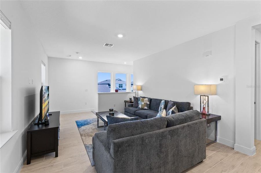 Furnished interior view inside a new home in Laureate Park, Orlando (Image 42).