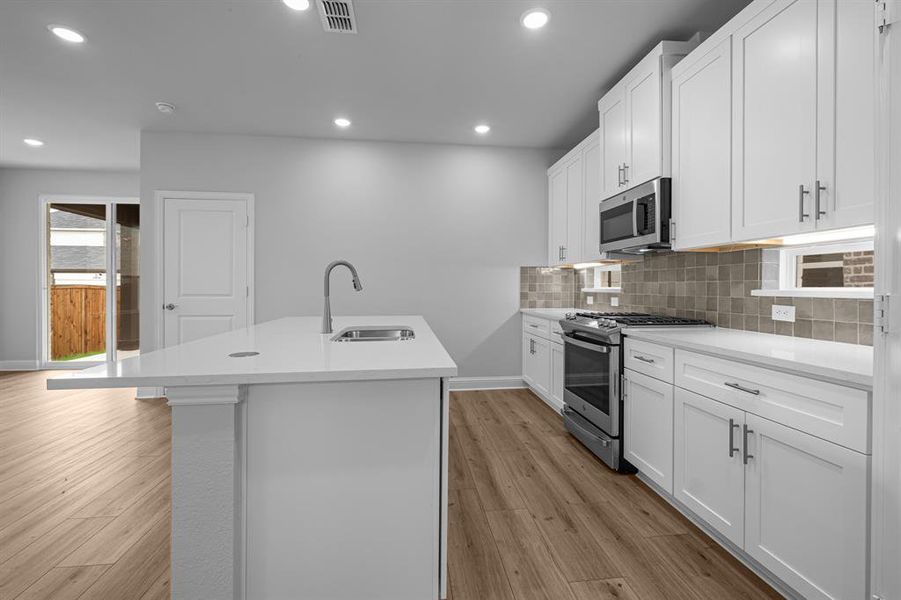 Furnished interior view inside a new home in Symmetry 37s, Frisco (Image 3).