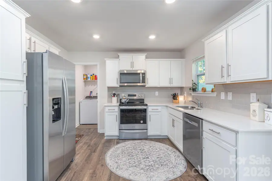 Furnished interior view inside a new home in , Candler (Image 6).