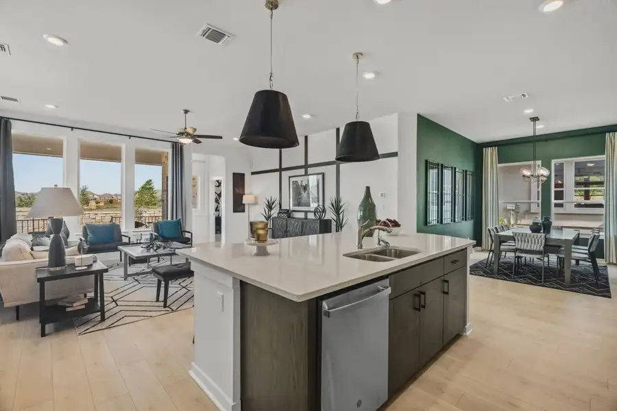 Representative furnished interior of a home built from the Peyton by Chesmar Homes in Highland Village, Georgetown (Image 3).