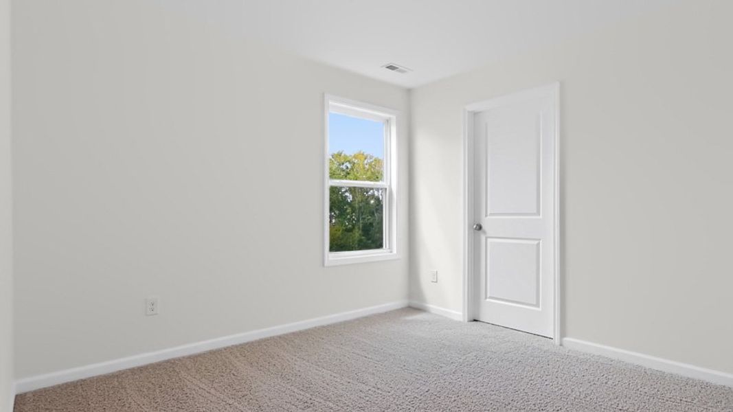 Spacious, unfurnished interior of a new home in The Grove at Winston Pointe, Clayton (Image 24).