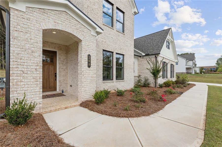 Exterior details and patio area of a home in The Reserve at Knollwood, Canton (Image 3).
