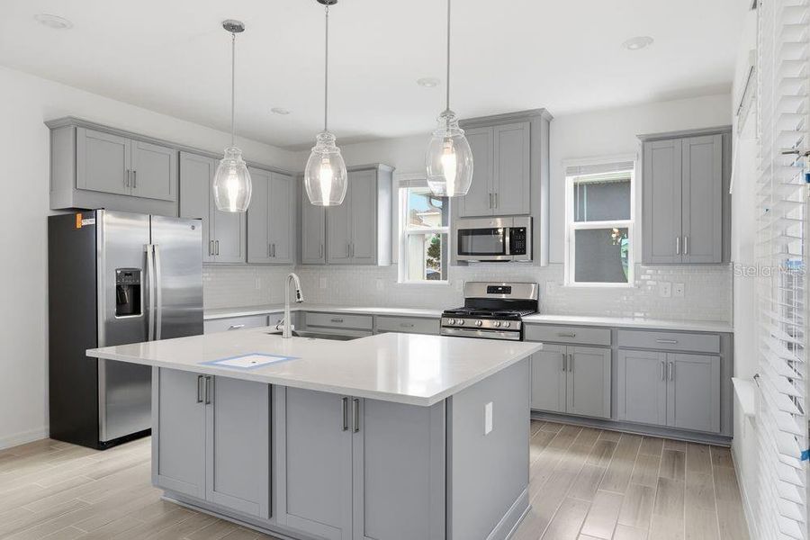 Furnished interior view inside a new home in Harvest at Ovation, Winter Garden (Image 8).