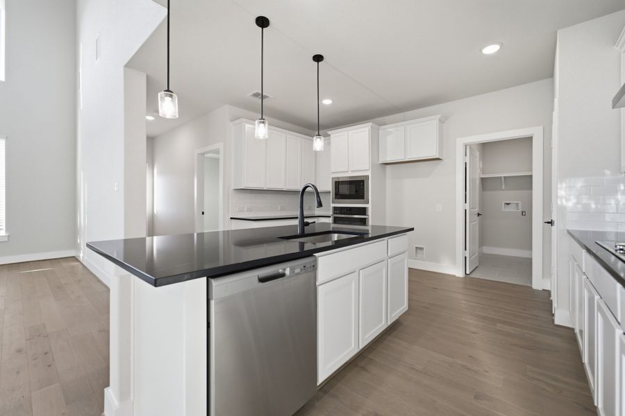 Furnished interior view inside a new home in The Woodlands at Medina Hills, Mico (Image 12).