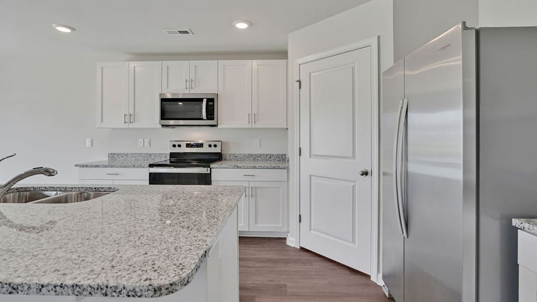 Representative furnished interior of a home built from the HAYDEN by D.R. Horton in Patriot Pointe at Towne Pointe, Jacksonville (Image 7). Representative furnished interior of a home built from the HAYDEN by D.R. Horton in Patriot Pointe at Towne Pointe, Jacksonville (Image 7).