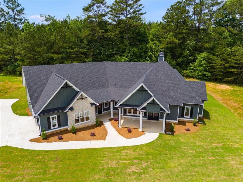 Front exterior of a new home in The Meadows at Lake Circle, Buchanan, GA, highlighting curb appeal (Image 25).