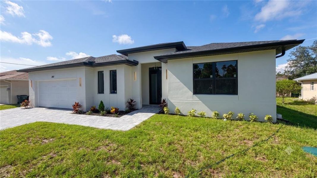 Exterior details and patio area of a home in , North Port (Image 18).