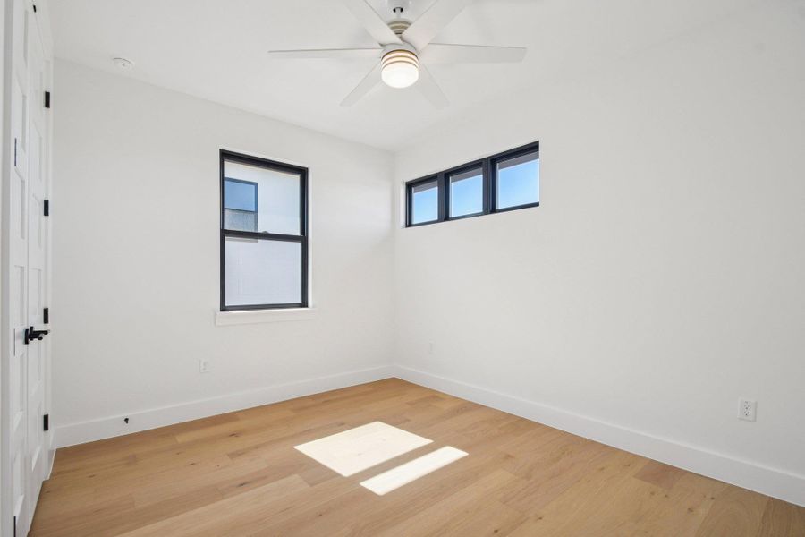 Spacious, unfurnished interior of a new home in Milky Way at River Place, Austin (Image 26).